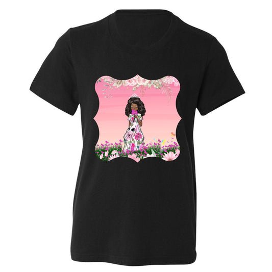 Black t-shirt with a colorful graphic of a girl in a garden on a white background