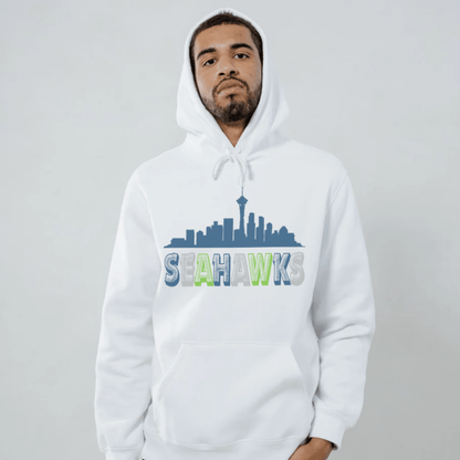 Person wearing a white hoodie with 'Seahawks' design with city skyline